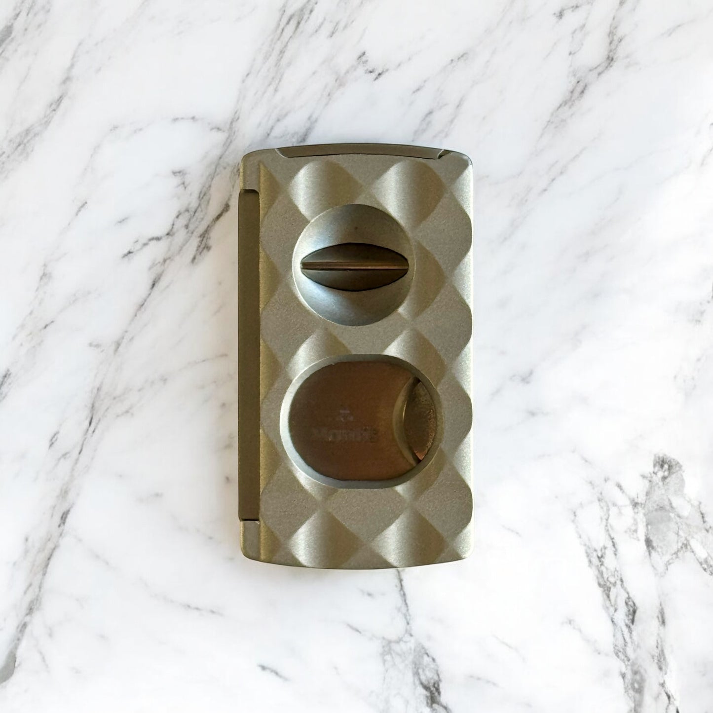 Universal Cutter with exclusive faceted finish.